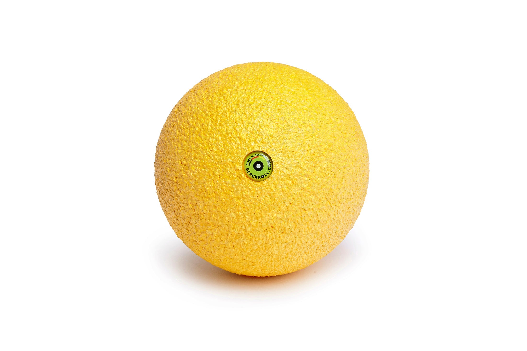 Yellow trigger point therapy ball