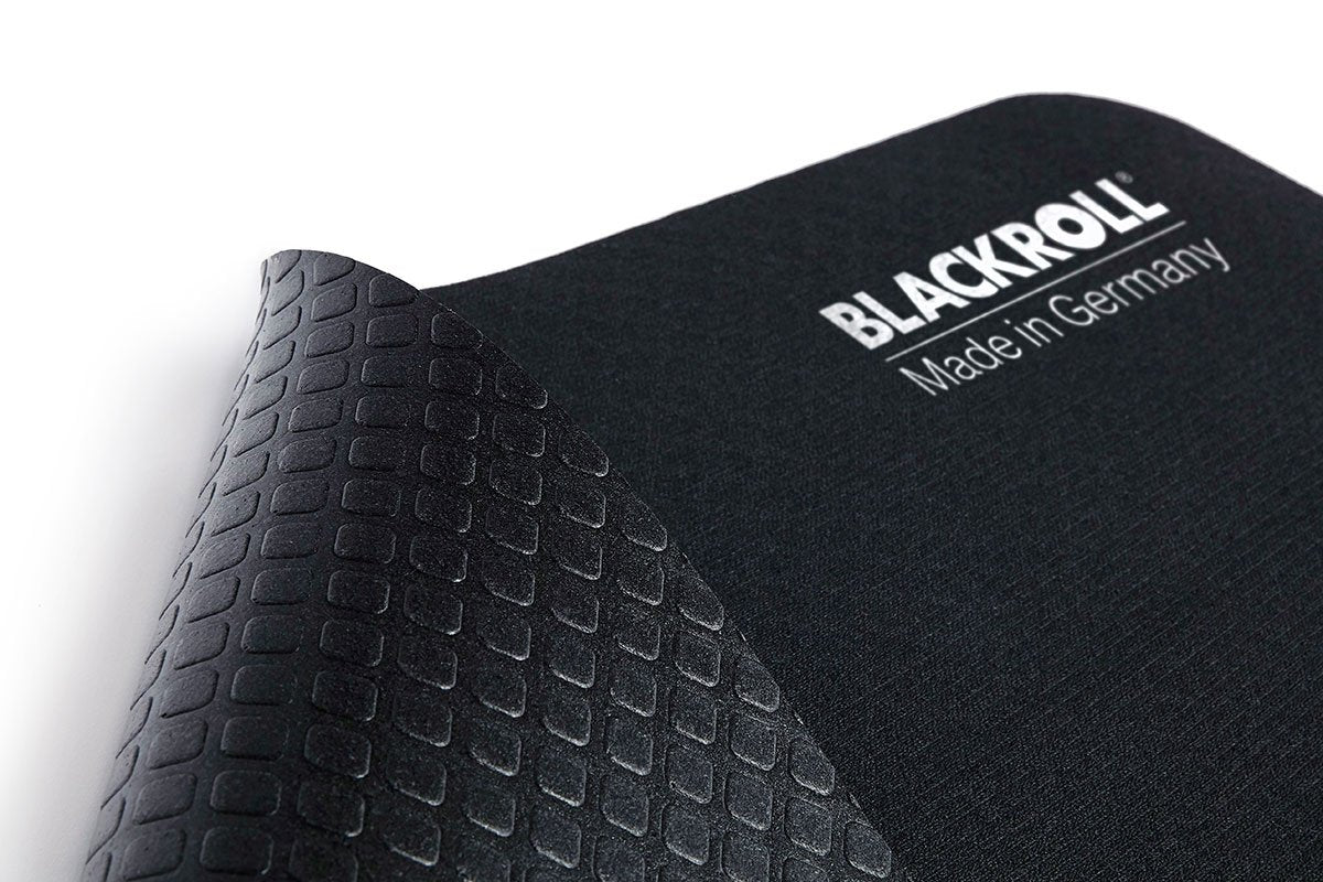 Close-up of BLACKROLL® yoga mat showing textured, non-slip surface