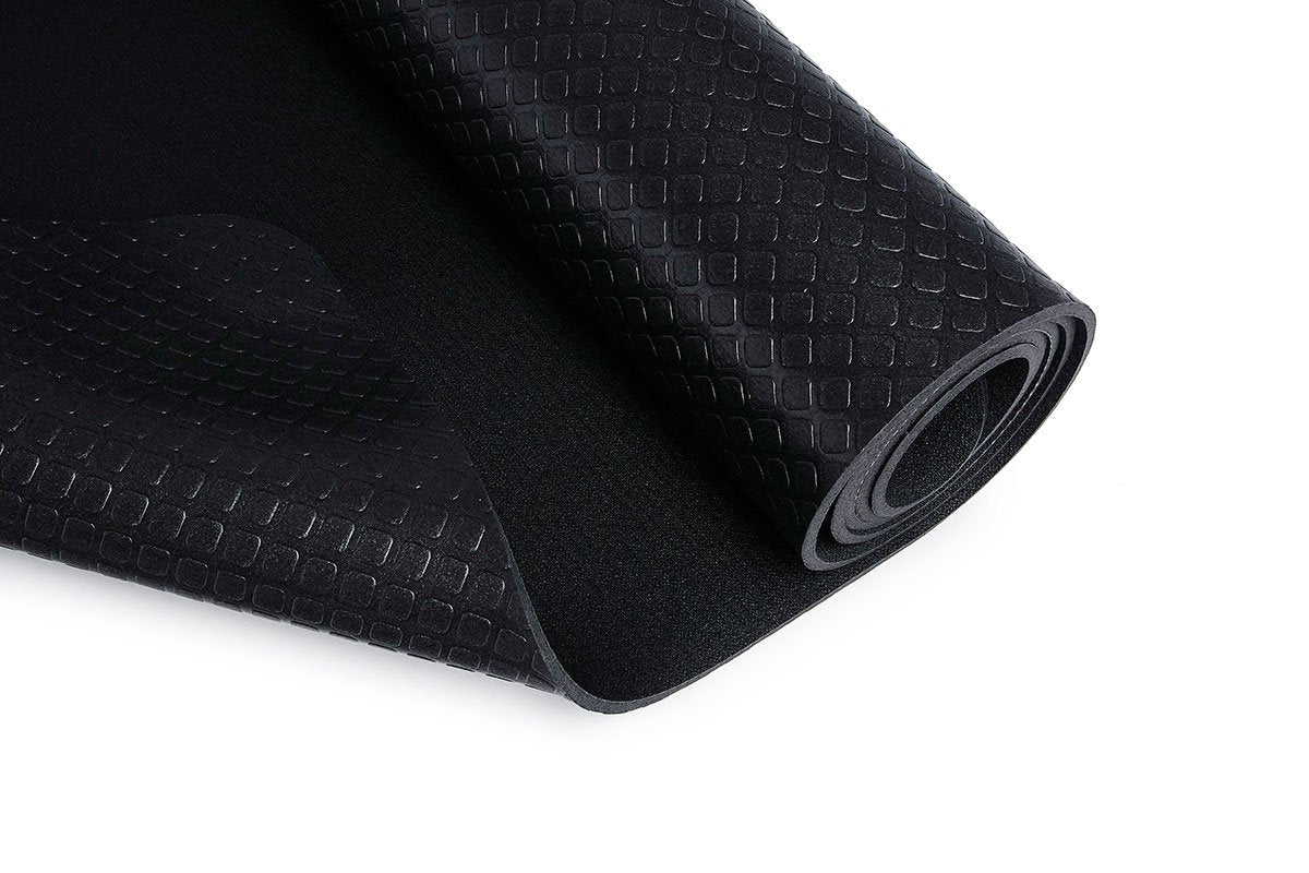 BLACKROLL® fitness and yoga mat folded to show thickness and grip