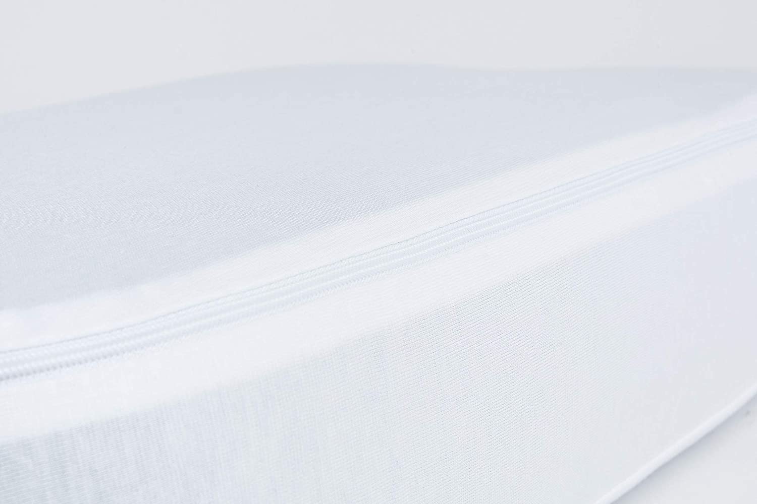 Close-up of white BLACKROLL® recovery pillow case fabric texture